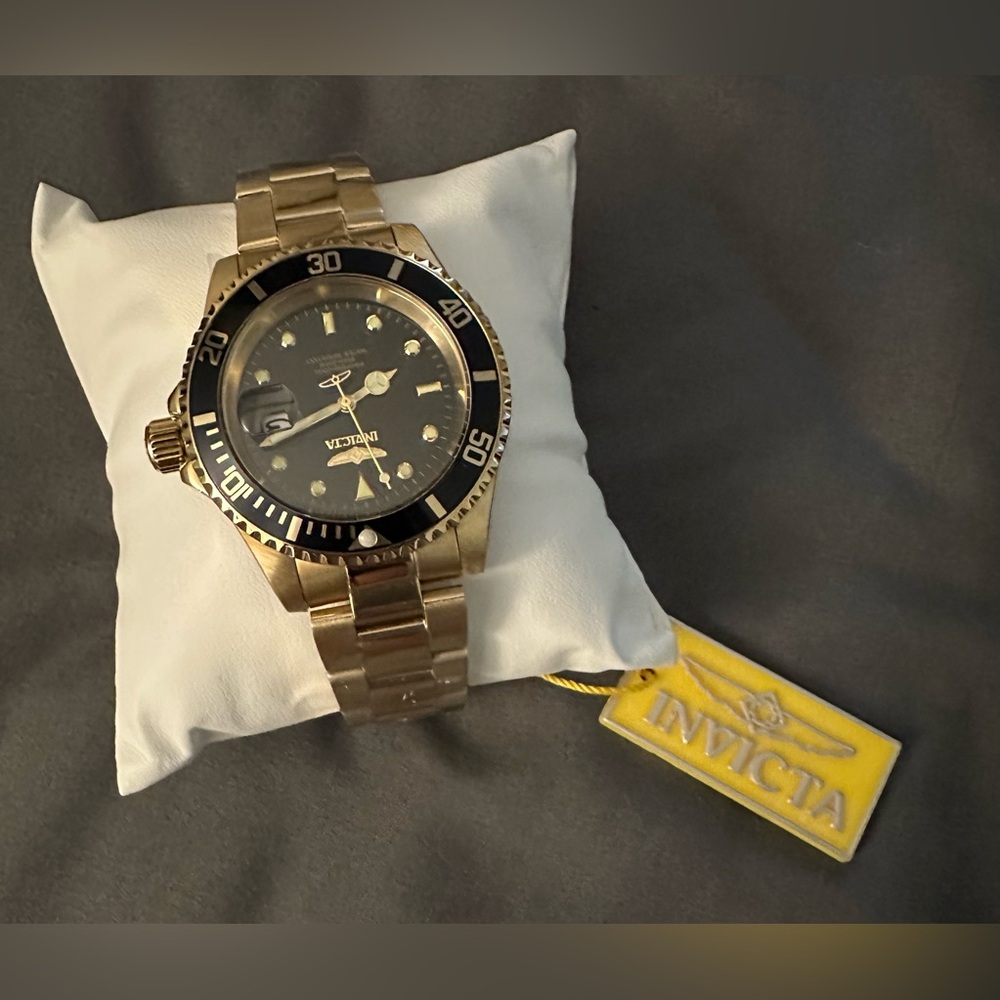 Invicta Luxurious Gold and Black Timepiece